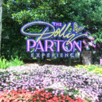 Dolly Parton teases new project at Dolly Parton Experience opening event