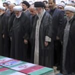 Iran’s supreme leader prays at president's funeral service