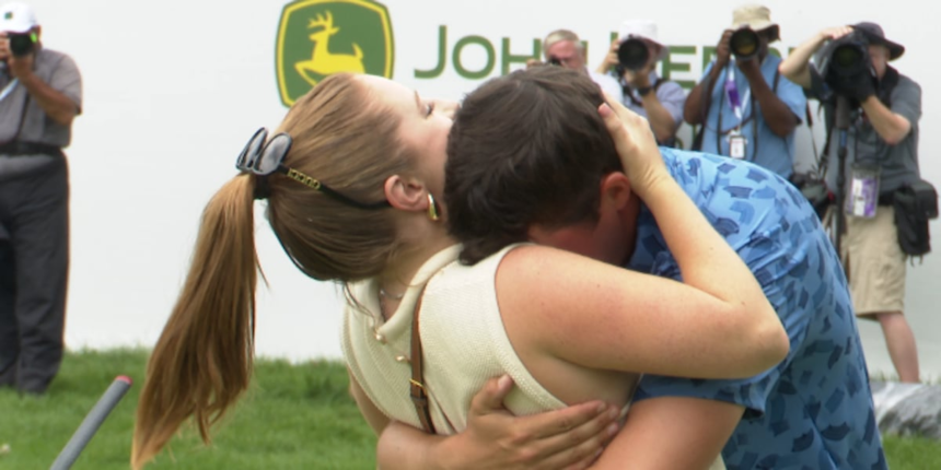 Davis Thompson celebrates JDC victory with his wife