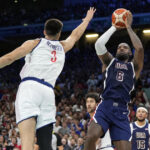 LeBron James, Kevin Durant lead U.S. men's basketball team past Serbia in opening Olympics game