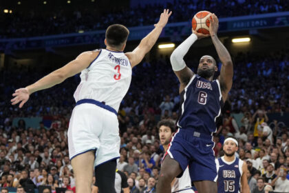 LeBron James, Kevin Durant lead U.S. men's basketball team past Serbia in opening Olympics game