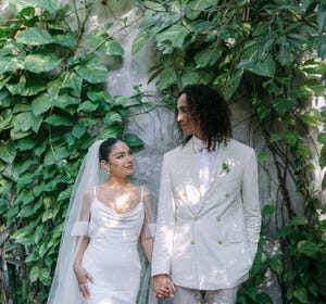 Vanessa Hudgens wears custom Vera Wang in her wedding to baseball player Cole Tucker.