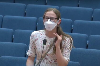 Violet Affleck speaking at a Los Angeles County board of supervisors meeting.