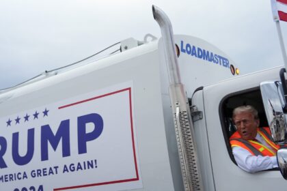 Trump boards a garbage truck to draw attention to Biden remark