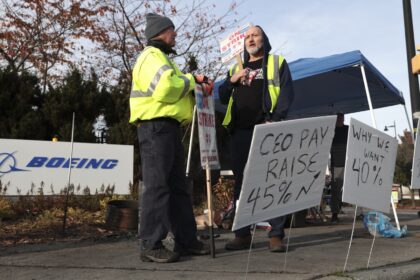 Striking Boeing machinists vote on new contract with 38% raises