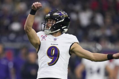 Baltimore Ravens place kicker Justin Tucker (9) watches his extra point against the Houston Texans during the first half of an NFL football game Wednesday, Dec. 25, 2024, in Houston. (AP Photo/Eric Christian Smith, File)