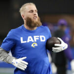 Los Angeles Rams wide receiver Cooper Kupp catches a pass before an NFL wild card playoff football game against the Minnesota Vikings, Monday, Jan. 13, 2025, in Glendale, Ariz.